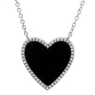 Elegant heart-shaped black diamond pendant necklace with silver chain from our exclusive jewelry collection