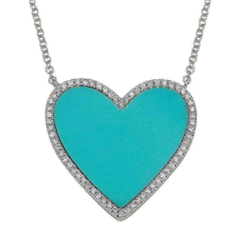 Heart-shaped turquoise pendant with diamond accents on silver chain necklace from our exclusive jewelry collection.