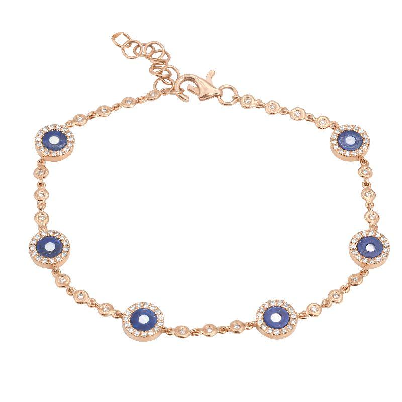 Elegant gold bracelet with blue gemstone accents from our exclusive jewelry collection.