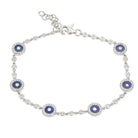 Elegant silver bracelet with blue gemstone charms by our jewelry brand.