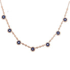 Elegant gold necklace with blue gemstone pendants from our jewelry collection. Perfect for enhancing any outfit.