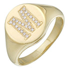 Gold signet ring with diamond-studded letter M from our exclusive jewelry collection