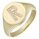 Elegant gold signet ring with diamond-studded letter 'R' engraved, designed by our premium jewelry brand.