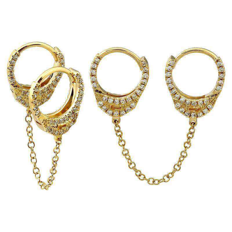 Gold hoop earrings with diamond accents and connecting chains from our luxury jewelry collection.