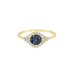 Elegant gold ring with a blue sapphire center surrounded by sparkling diamonds.