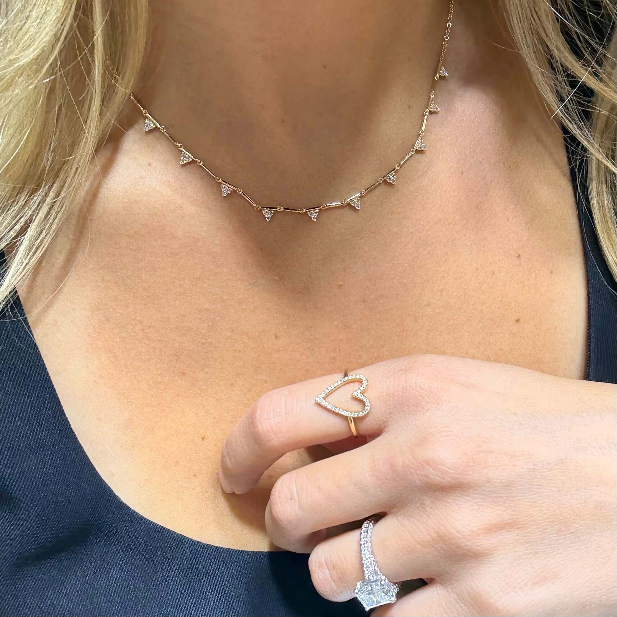 14K Gold Diamond Triangle Bars Necklace worn by a model showcasing its elegant design and sparkling micro pave diamonds.