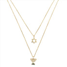 Dual-layer gold necklace with Star of David and menorah pendants, signature piece from our jewelry collection.