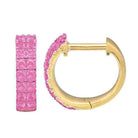 Gold hoop earrings with pink gemstone studs from our jewelry collection.