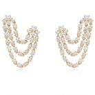 Gold triple strand chandelier earrings with sparkling diamonds from our luxury jewelry collection