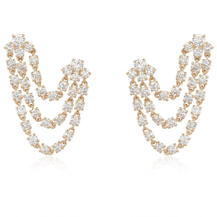 Gold triple strand chandelier earrings with sparkling diamonds from our luxury jewelry collection