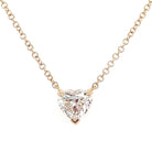 Heart-shaped diamond pendant on a delicate gold chain from our jewelry collection.