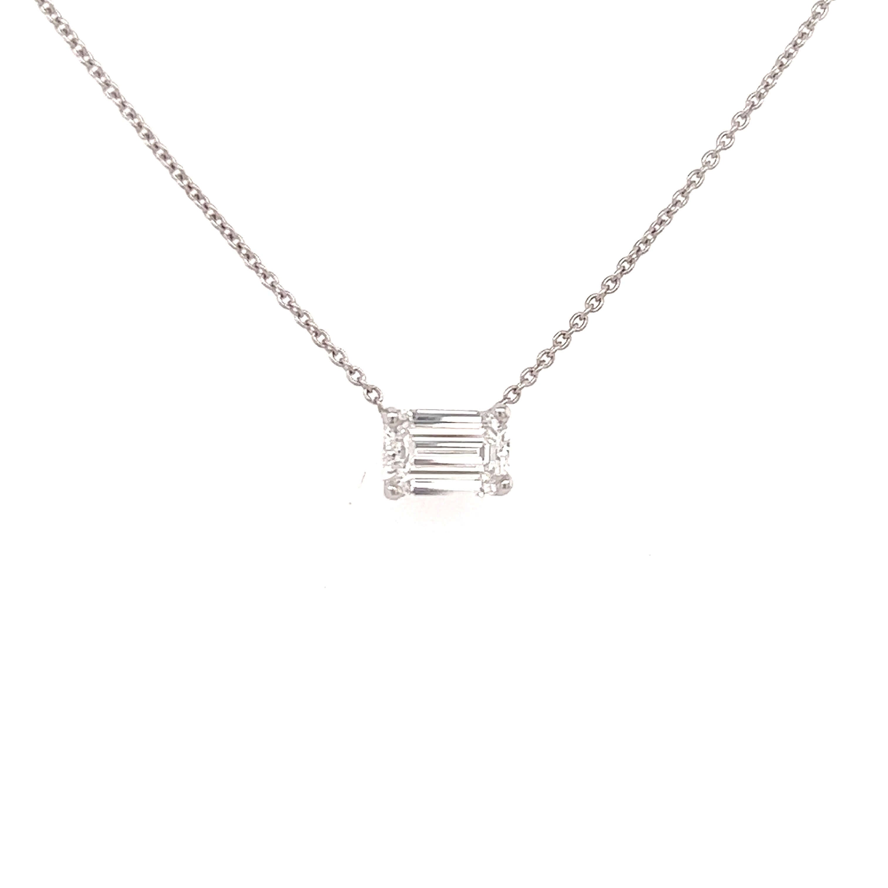 Elegant white gold necklace with a rectangular diamond pendant from our luxury jewelry collection.