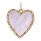 Heart-shaped mother of pearl pendant with diamond trim, reflecting luxury and elegance from our jewelry collection.