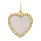 Gold heart pendant with white center and diamond accents from our luxury jewelry collection