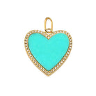 Gold heart pendant with turquoise center and diamond accents from our exclusive jewelry collection