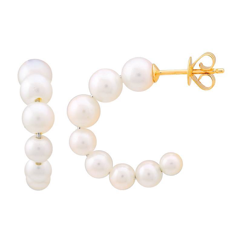 Elegant white pearl hoop earrings with gold accents from our exclusive jewelry collection.