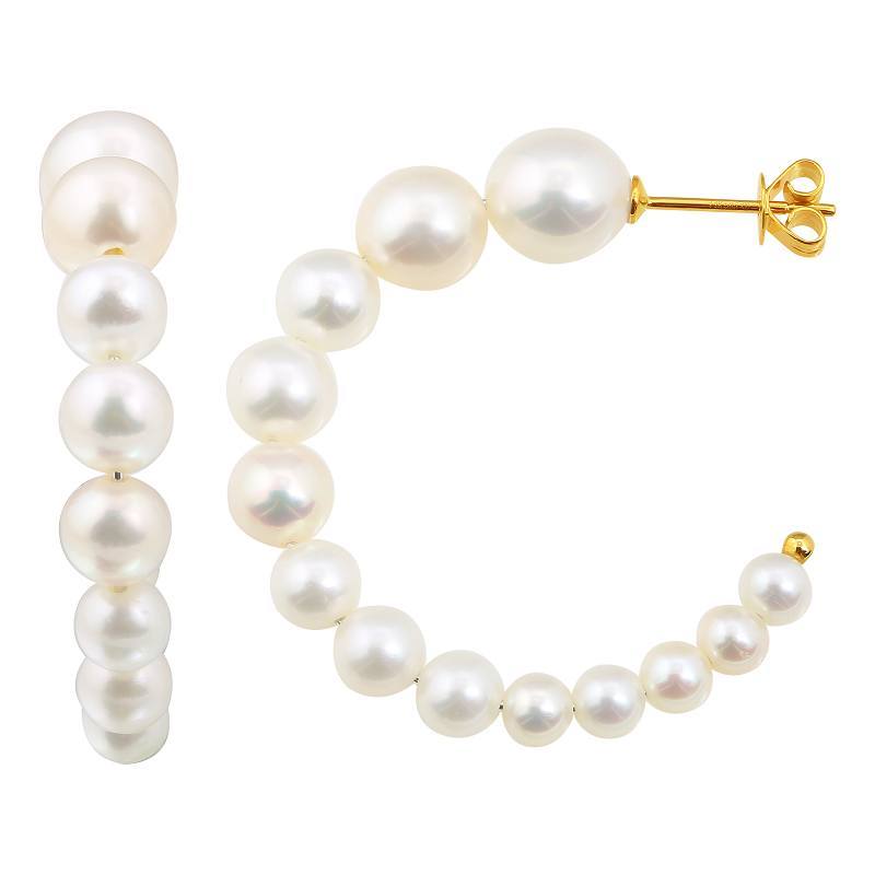 Elegant gold hoop earrings adorned with cascading white pearls from our luxury jewelry collection.