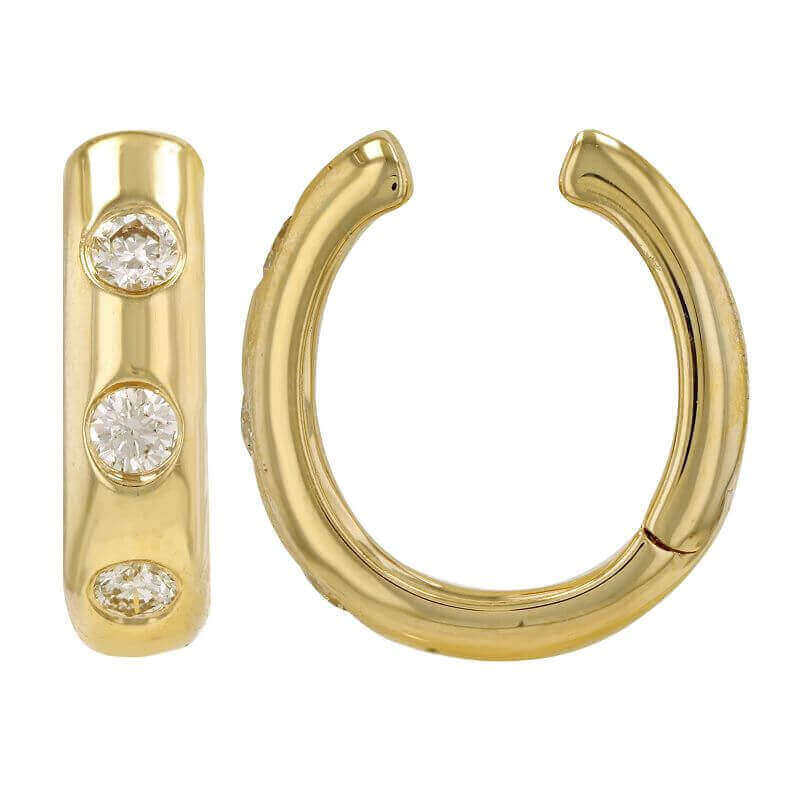 Gold hoop earrings with three embedded diamonds from our exclusive jewelry collection