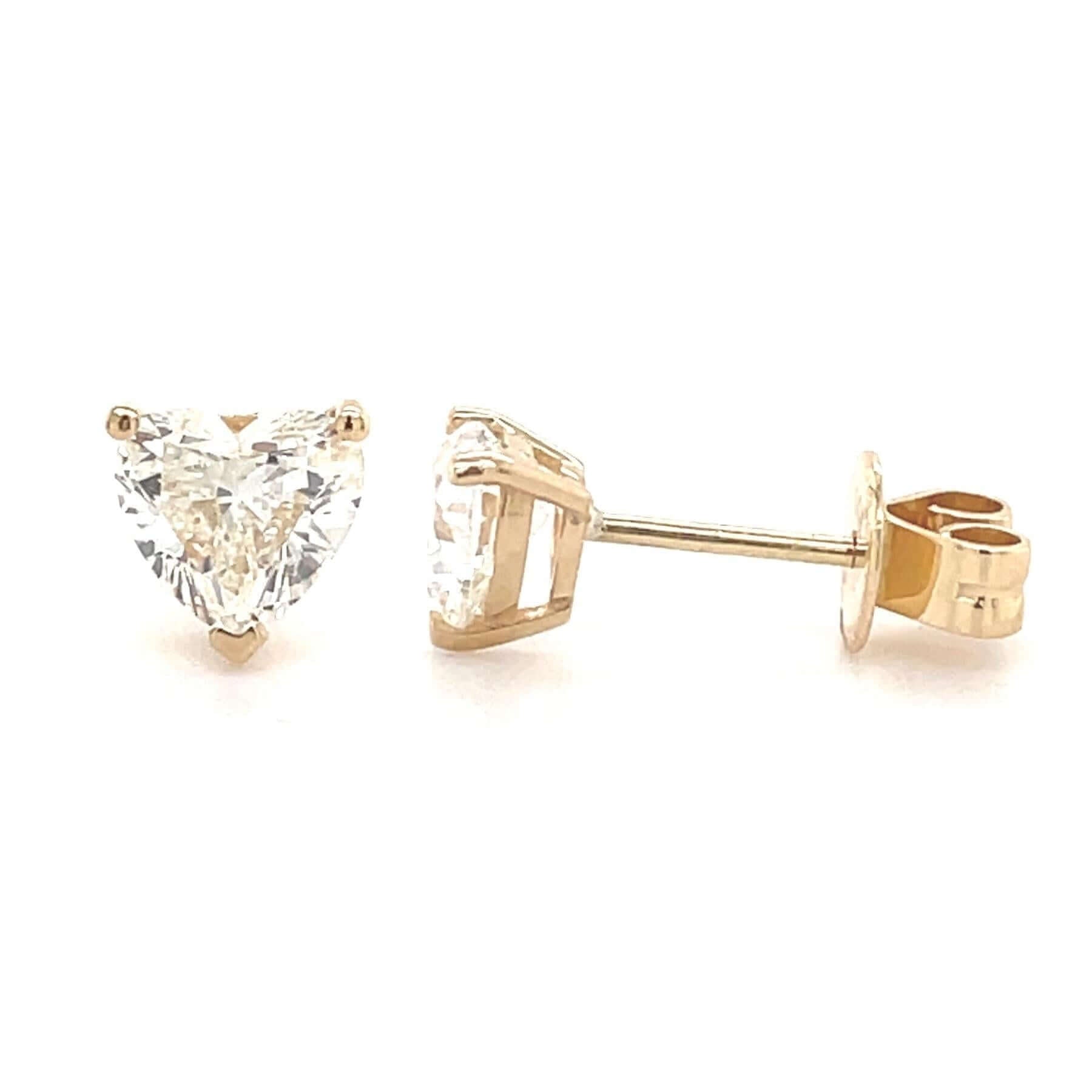 Triangular diamond stud earrings in gold setting from our exquisite jewelry collection. Perfect for elegant occasions and daily wear.