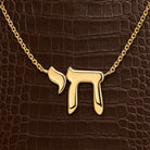 Hebrew Chai Gold Necklace in 14K yellow gold, styled, Izakov Fine Jewelry