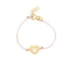 14K gold Hebrew initial cutout cord baby bracelet with pink cord, customizable design for children.