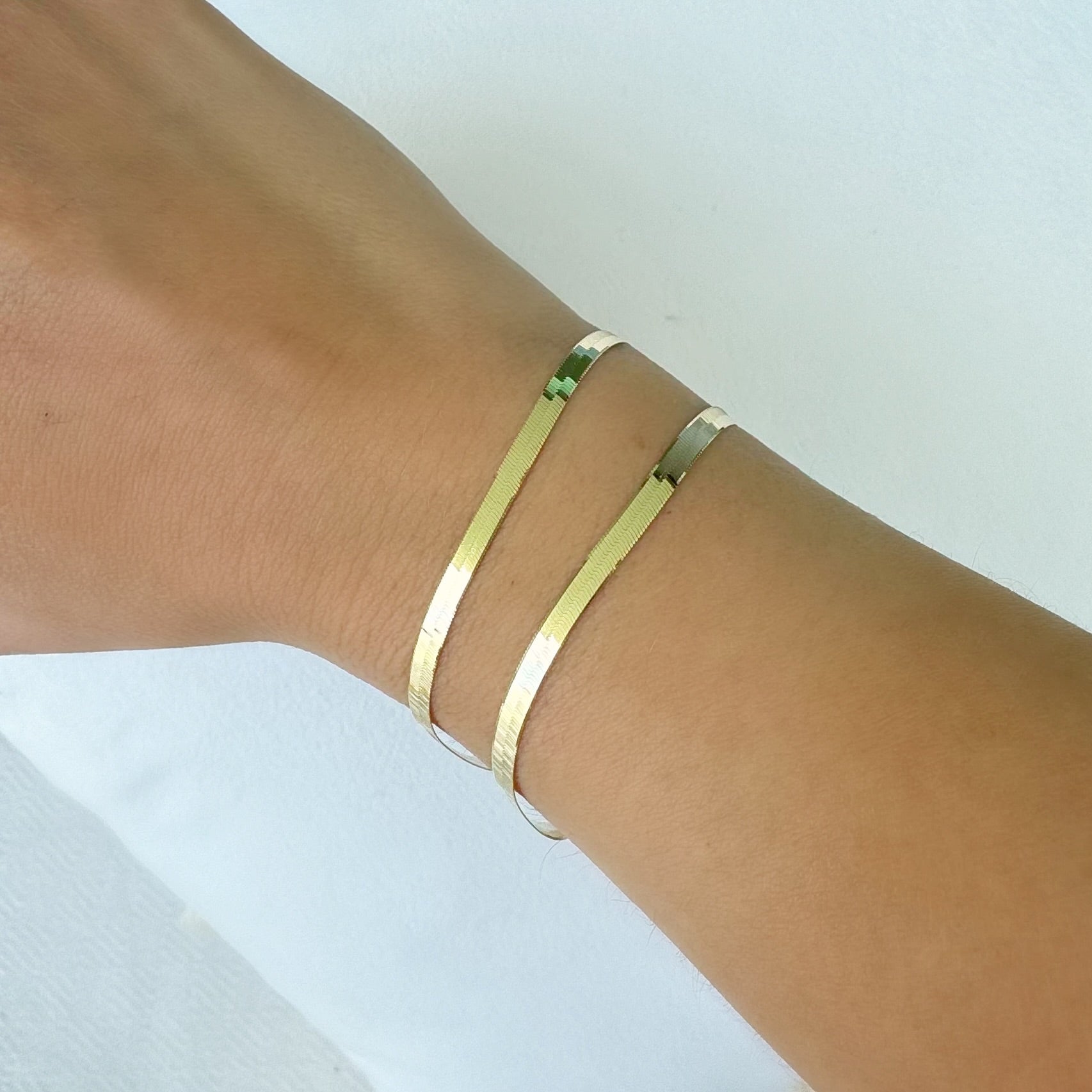 14K Gold Herringbone Chain Bracelet 3mm 7" Yellow Gold Bracelets by Izakov Diamonds + Fine Jewelry | Izakov