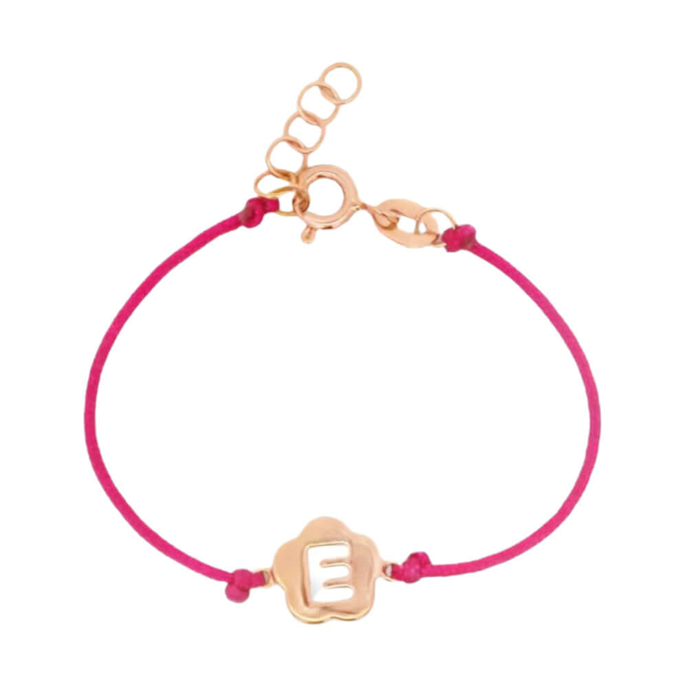 14K gold initial cutout baby bracelet with pink cord featuring the letter 'E', customizable and stylish.