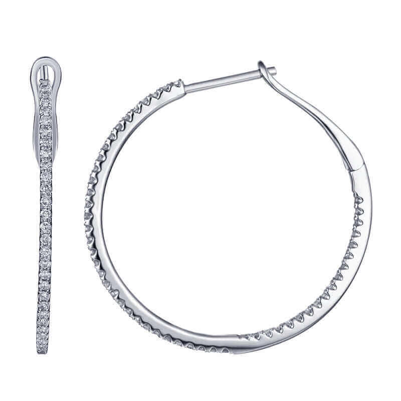 Elegant sterling silver hoop earrings adorned with sparkling pave diamonds - perfect for adding a touch of sophistication to any outfit