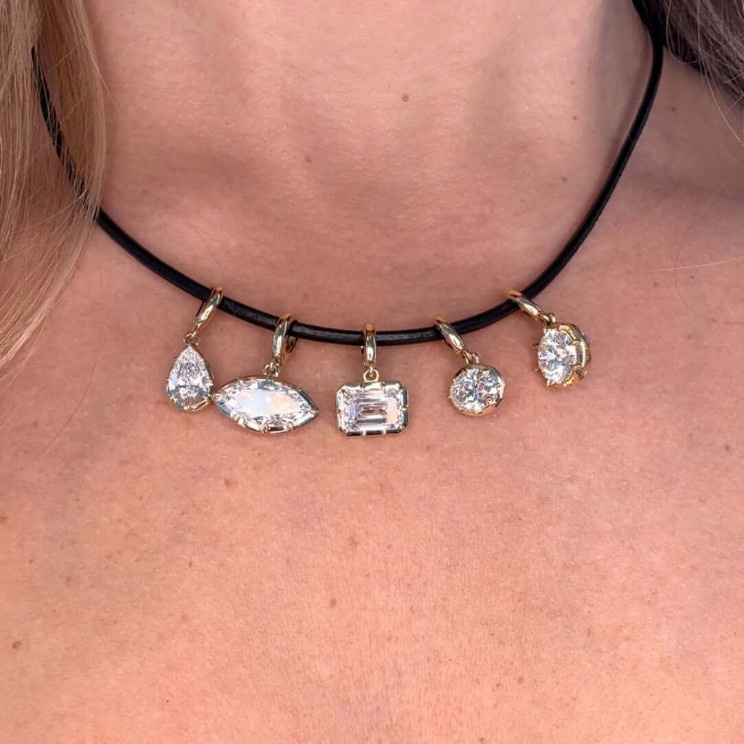 14K Gold Multi Prong Set Lab Diamond Pendant with various shapes on a black choker necklace.
