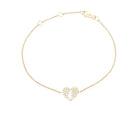 Land Of Israel Cutout Heart Pave Diamond Bracelet © on a delicate gold rolo chain with sparkling diamonds.