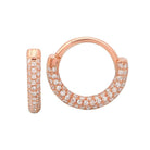 Rose gold hoop earrings with sparkling diamond accents from our luxury jewelry collection.