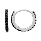 Elegant black stone-encrusted silver hoop earrings from our exclusive jewelry collection.