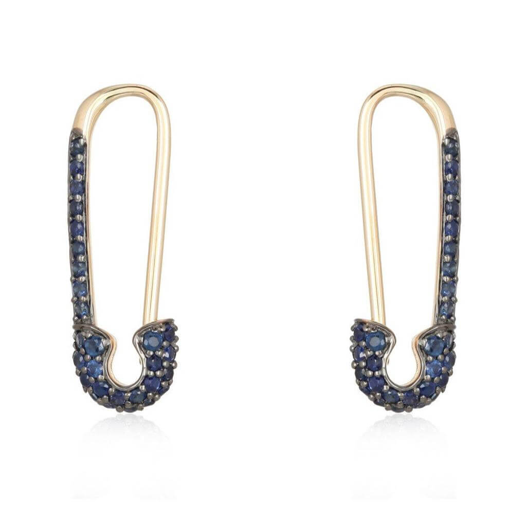 Elegant gold earrings with blue sapphire gemstones from our luxurious jewelry collection.