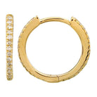 Gold hoop earrings with diamond accents from our luxury jewelry collection.