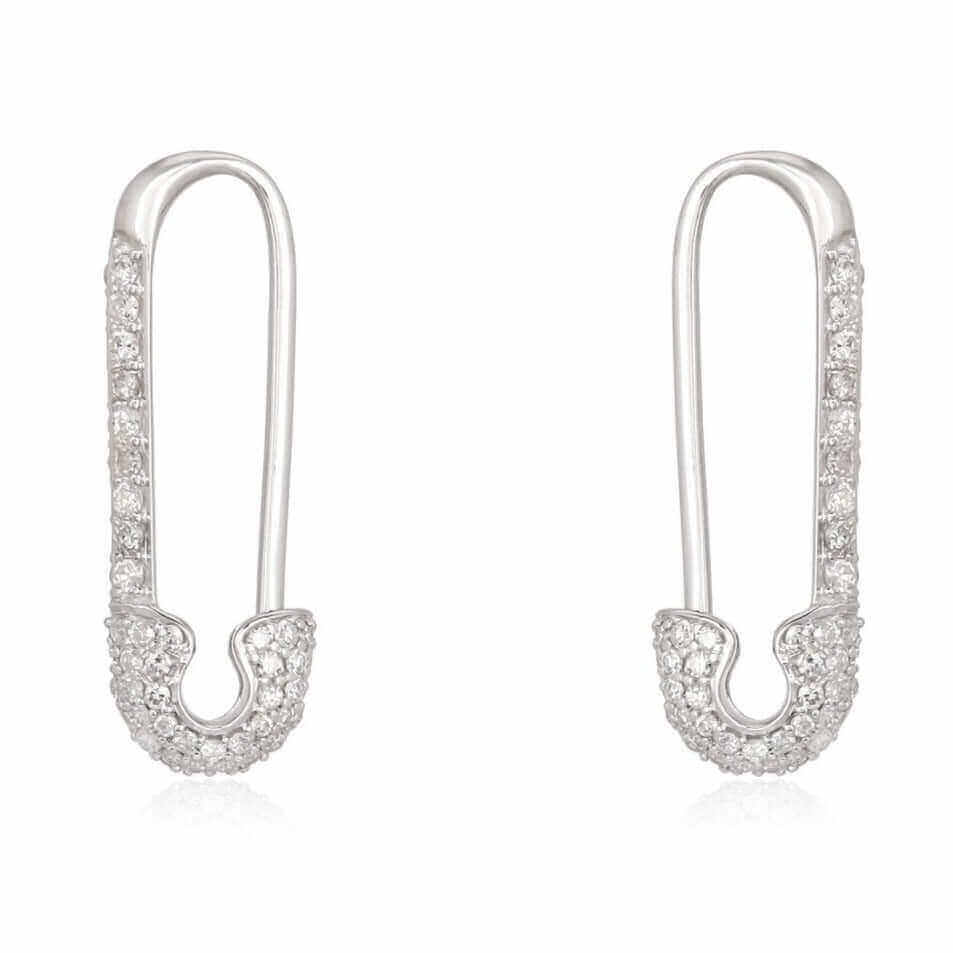 Elegant silver safety pin-shaped earrings adorned with crystals from our premium jewelry collection.