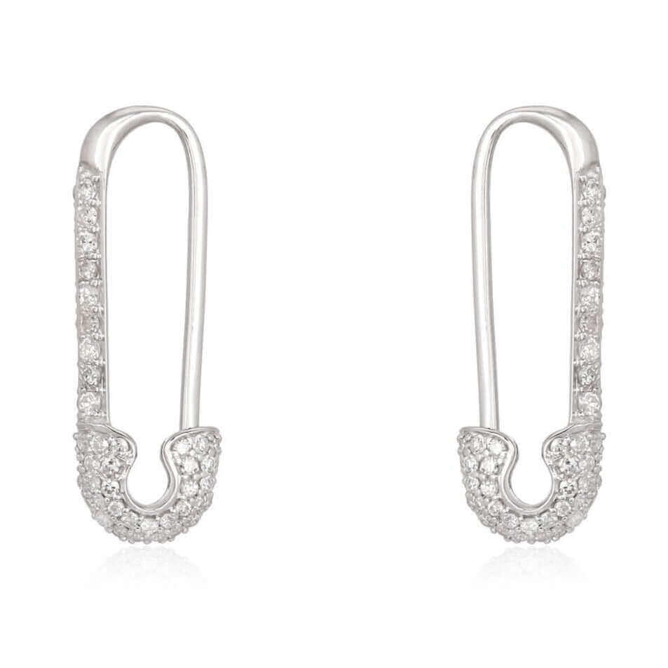 Elegant silver safety pin-shaped earrings adorned with crystals from our premium jewelry collection.