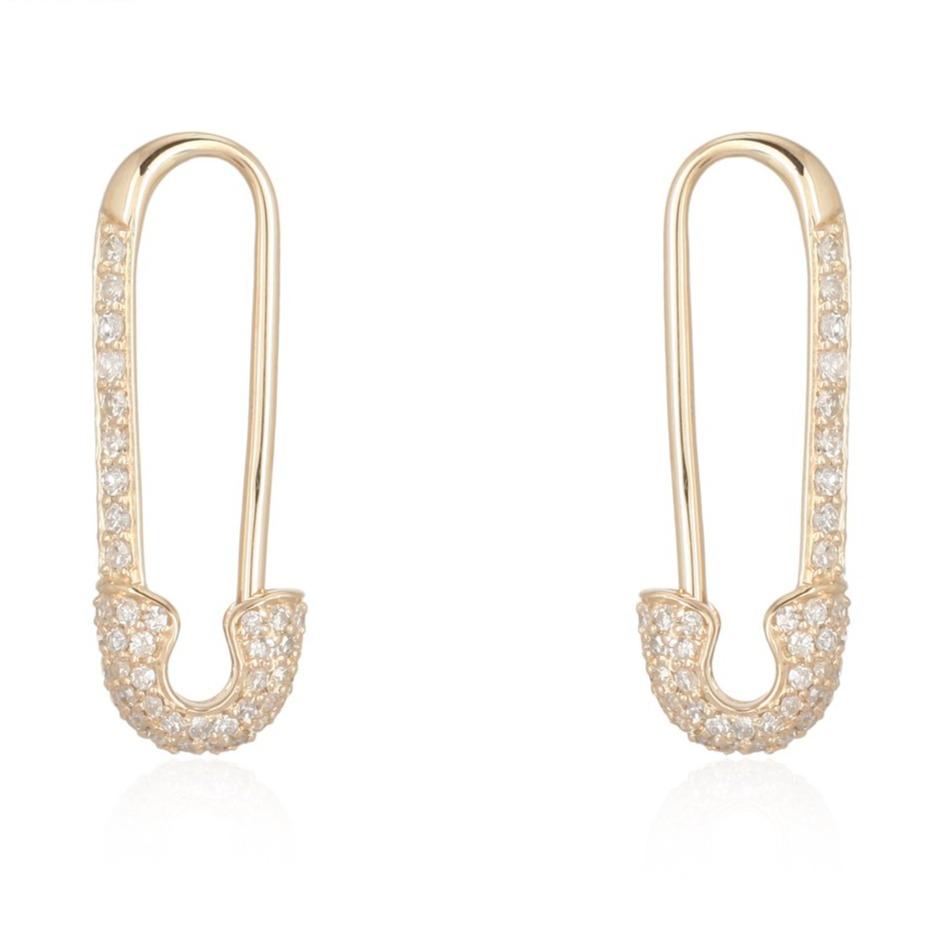 Elegant gold earrings with diamond accents - stylish jewelry for your sophisticated look.