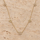 Stars of David Station Diamond Necklace in 14K yellow gold, styled, Izakov Fine Jewelry
