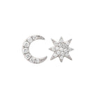 Moon and star diamond earrings from our jewelry brand. Elegant handcrafted celestial-themed jewelry for a glamorous look.