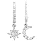 Sterling silver star and moon charm earrings with pave diamonds from our jewelry collection.