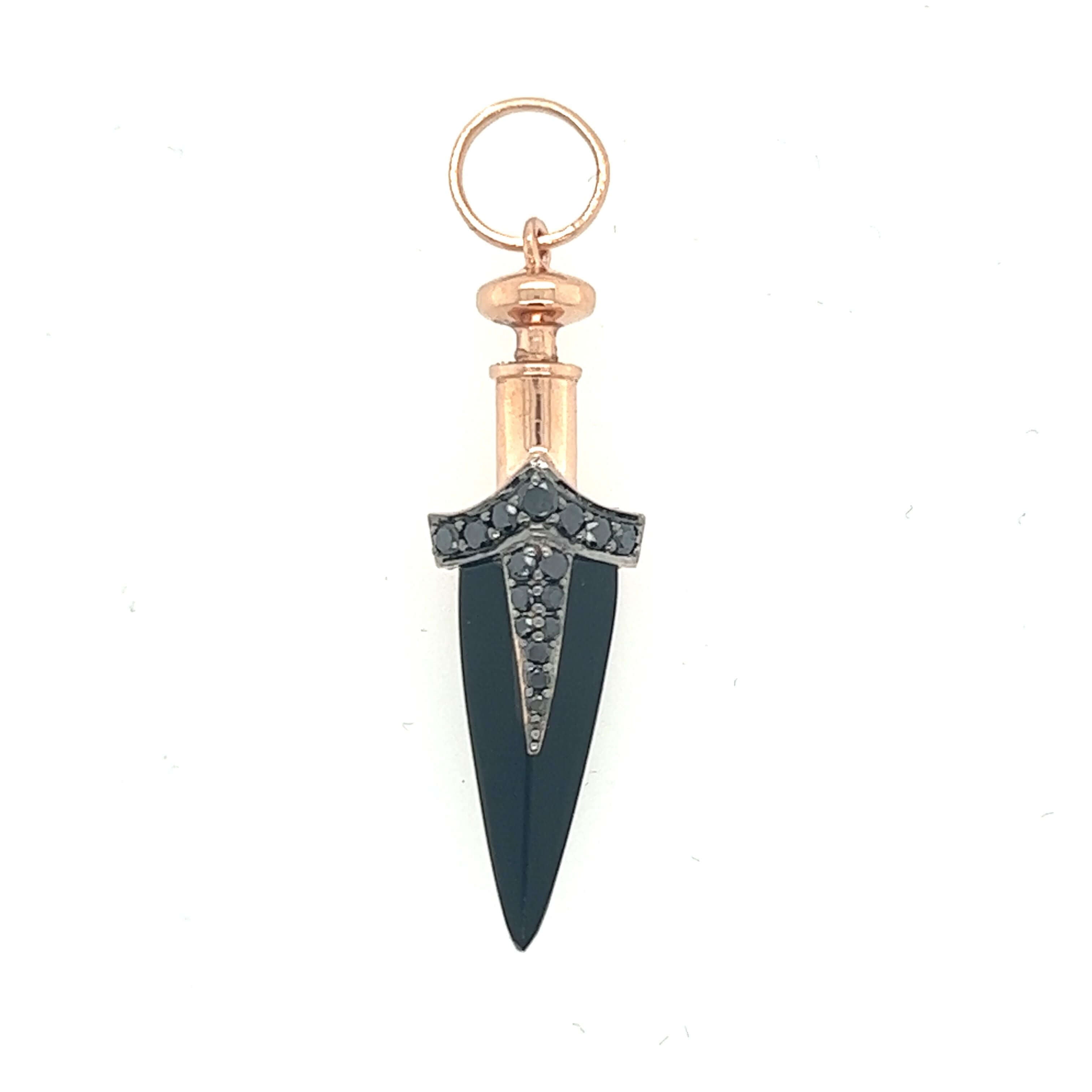 Elegant black and gold dagger pendant with diamond accents from our exclusive jewelry collection.