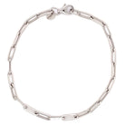 Elegant silver chain bracelet with lobster clasp, perfect for any jewelry collection.