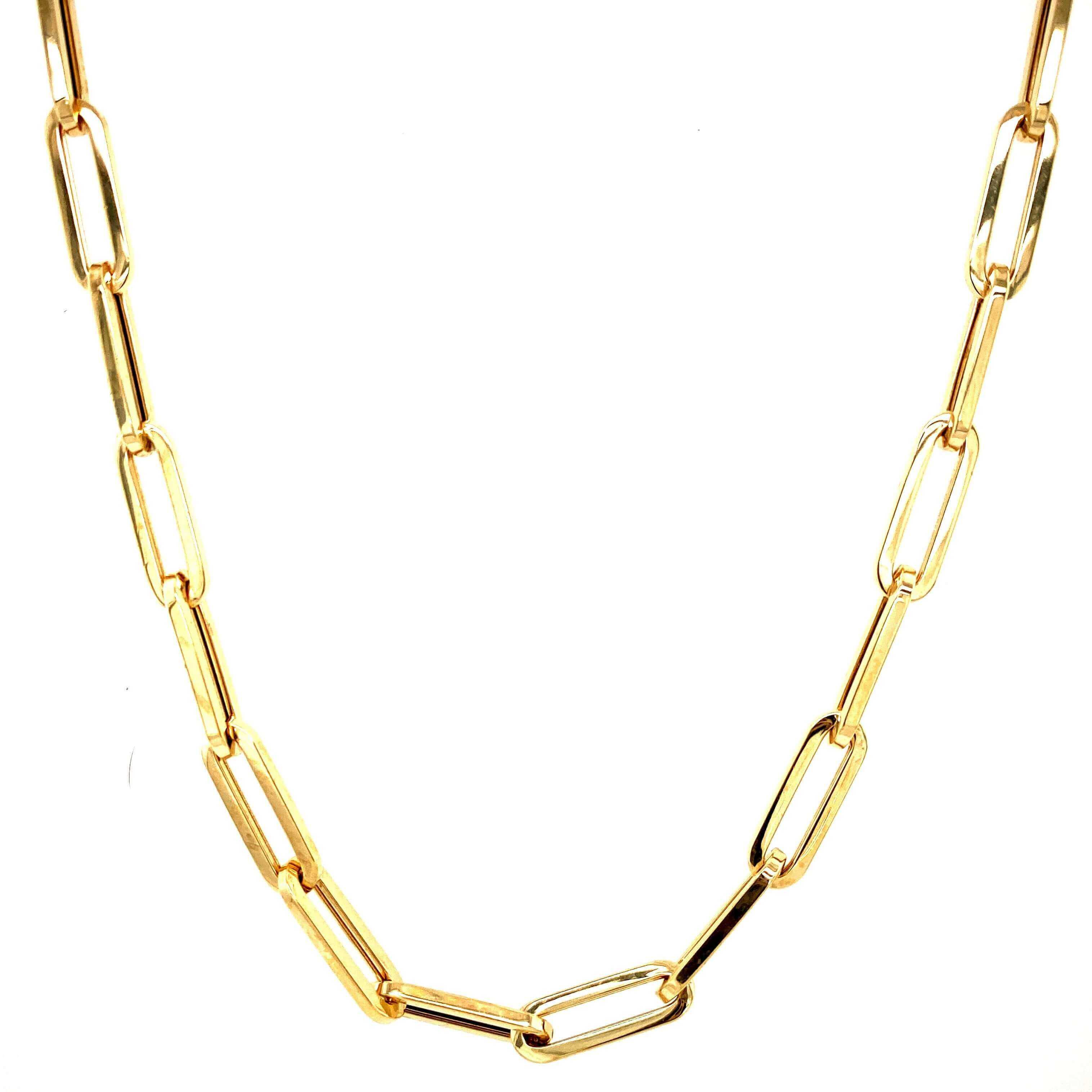 Sleek gold chain necklace with elongated rectangular links, perfect for adding elegance to any outfit - our jewelry brand.