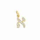 Gold pendant with diamond-studded Hebrew letter, elegant jewelry piece from our exclusive collection