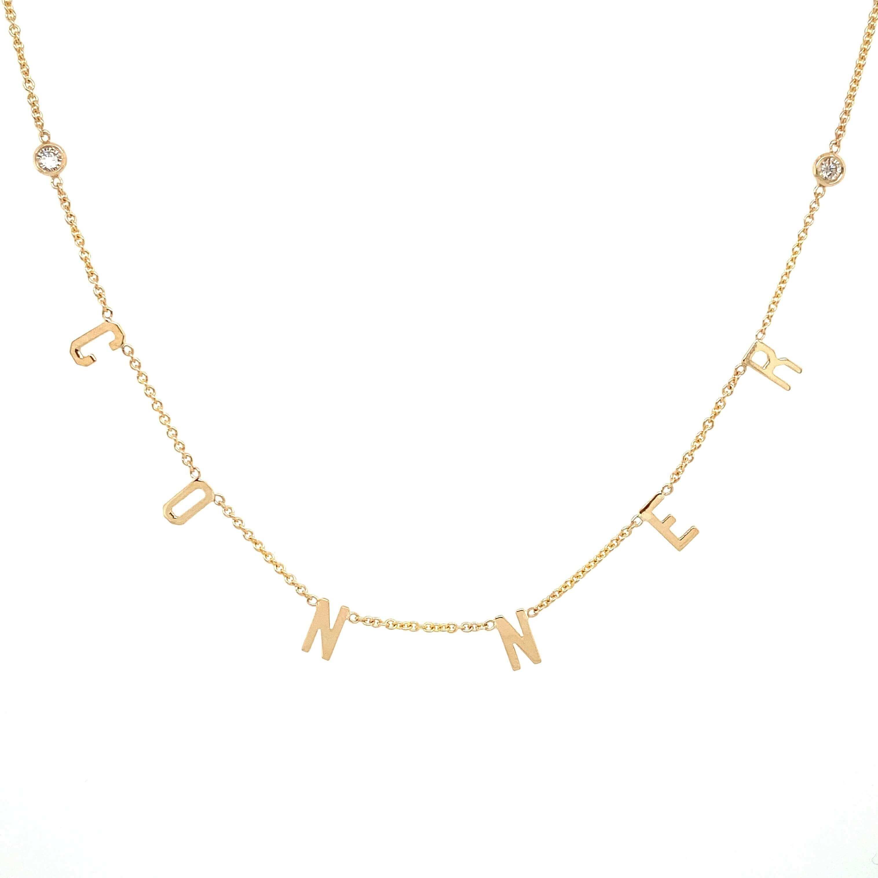 Personalized gold name necklace with diamond accents by our jewelry brand.