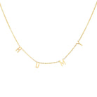 Gold letter charm necklace spelling out "ROMY" from our luxury jewelry collection.