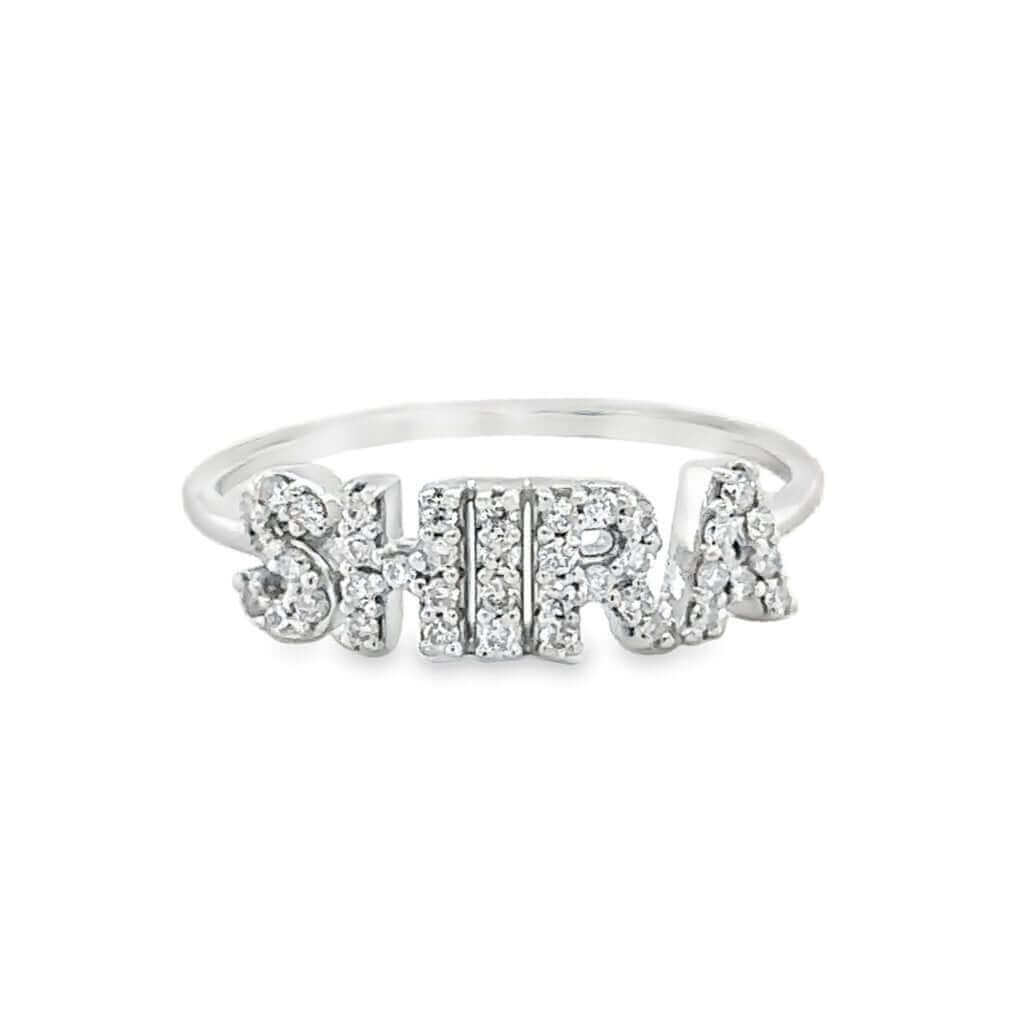 Customized silver ring with "SHIRA" and encrusted with sparkling diamonds from our jewelry collection.