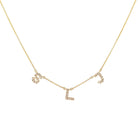 Gold necklace with S, L, and J diamond letter charms from our exclusive jewelry collection.