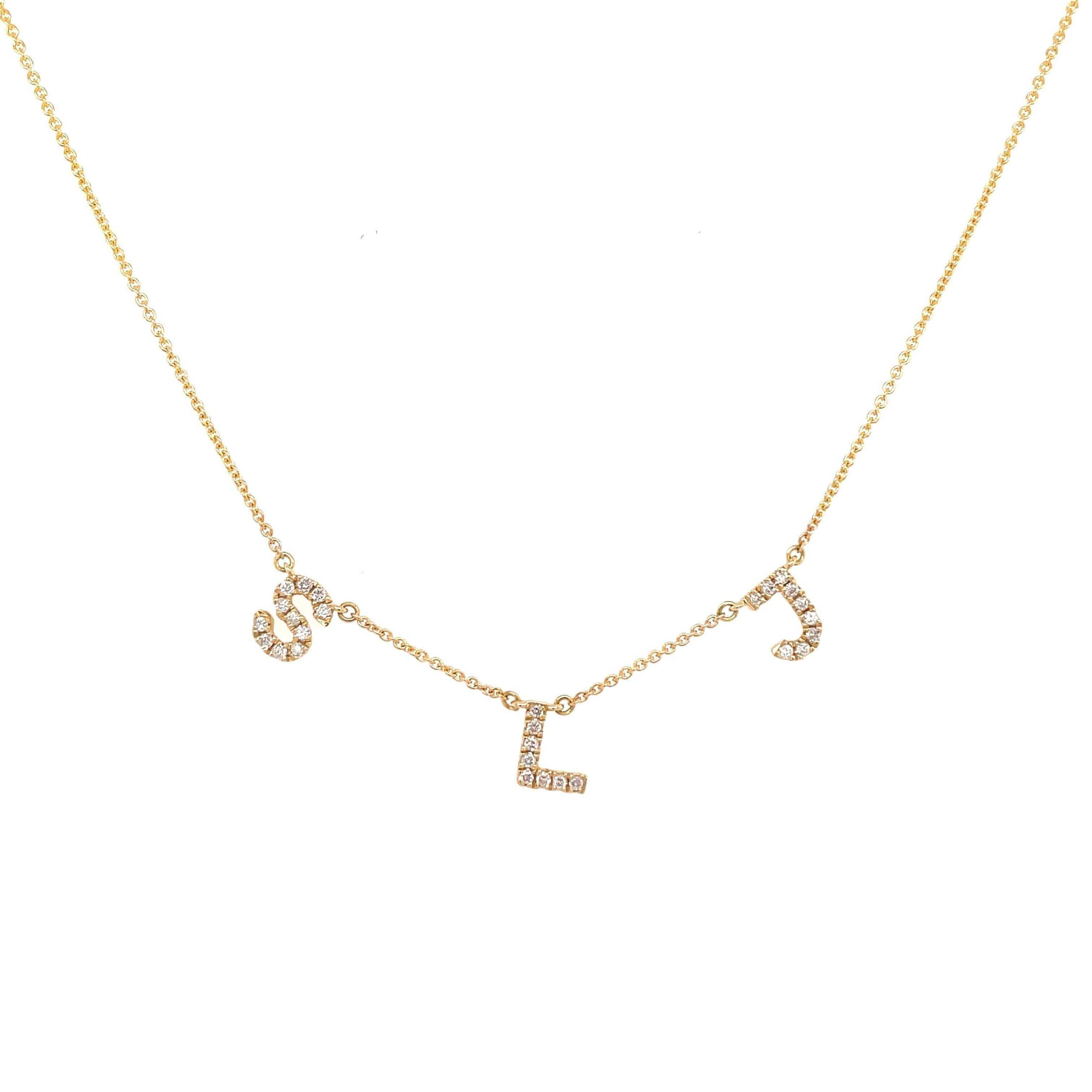 Gold necklace with S, L, and J diamond letter charms from our exclusive jewelry collection.