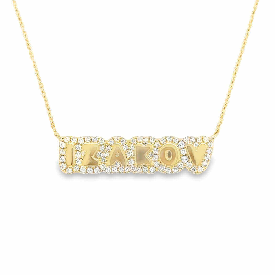 Custom gold name necklace with diamond accents from our jewelry brand.